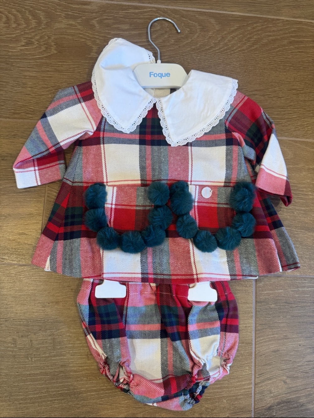 Que Red & Green Plaid Baby Dress with Teal Pom-Pom Trim